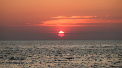 Fiery sunset over the ocean.

