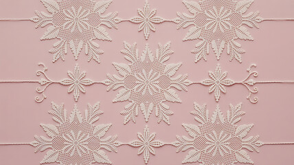 Pink background with repeating white floral patterns.
