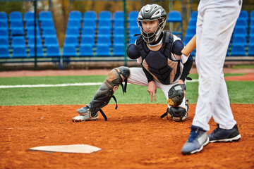 Obraz premium Two teenage boys enjoying a lively baseball game on an outdoor field