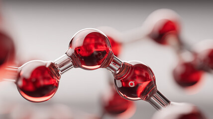 Abstract Red Glass Molecule Model Demonstrating Atomic Bonding and Molecular Symmetry. Represents chemical connectivity and the elegant structure underlying material science and biology.