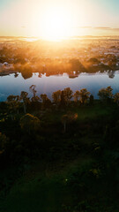 Warm golden sunshine penetrates a cold winter's day by the river.