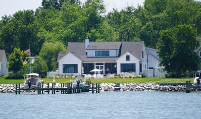 A waterfront property with a boat dock on the stone seawall near St Michaels, Maryland, U.S.A