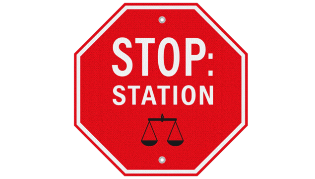 A vibrant red stop sign with bold white text reading 'STOP: STATION' and a black scale symbol.