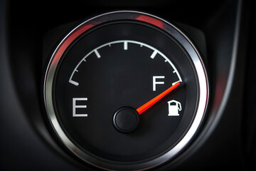 Full fuel gauge in car dashboard, vehicle gas tank indicator