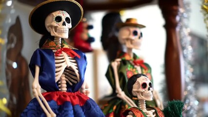Day of the Dead skeletons in finery