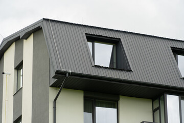 Mustard plants are thriving in a lush green field, surrounded by nature under overcast skies, showcasing the vibrant yellow flowers of the crop