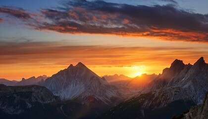 serene alpine wilderness at sunset with golden peaks and vibrant sky