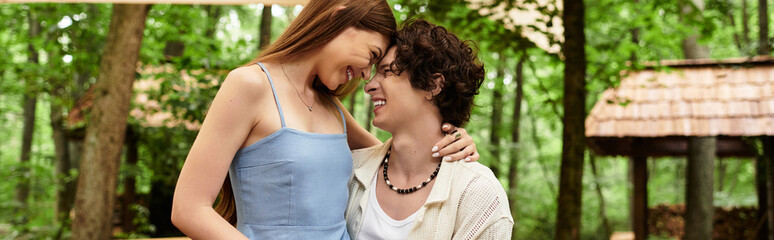 Relaxing moments of a young couple enjoying natures embrace in a peaceful park setting