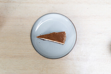 A slice of brownie tiramisu cake.