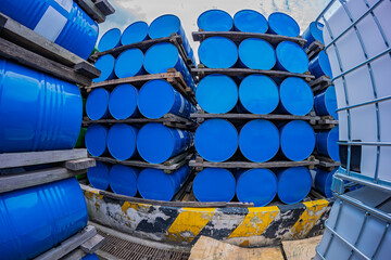 Barrels stock chemical products The metal barrels are blue. Chemistry