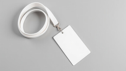 Blank ID badge with lanyard, ideal for events or identification purposes, showcasing simplicity and versatility