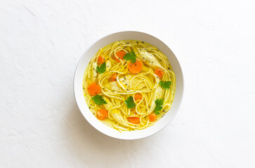 Noodle soup with chicken, carrots and greens. Healthy eating. Diet.