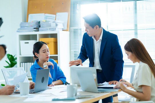 Group of creative Businesspeople brain storm meeting presentation,discussing roadmap to product launch, planning,strategy,dashboard,new business development,working with new startup project in office