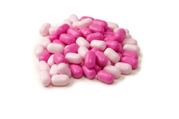 Sweet multicolored candies isolated on white background.