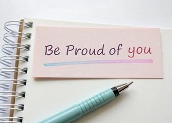 note saying be proud of you on clean pastel