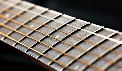Fototapeta premium Black guitar with strings from close up 