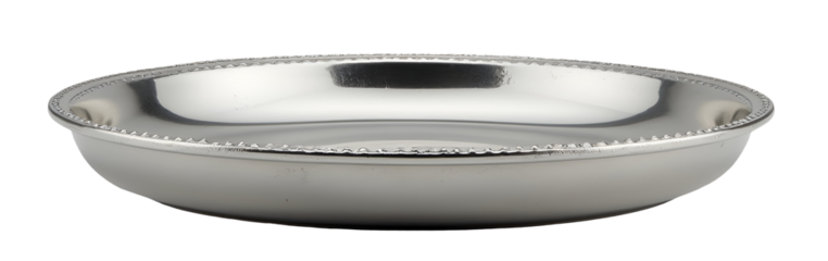 Shiny silver metal bowl with beaded rim. An elegant serving dish evokes luxury