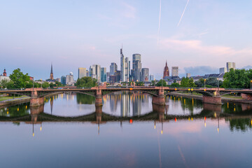 Naklejka premium Frankfurt City Downtown and Main River at Morning Twilight. View From Floserbrucke Bridge. Hesse, Germany