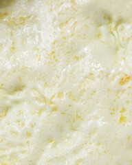 Close-up view of a perfectly cooked omelette, showcasing a golden-brown texture, fluffy interior, and a glossy surface, emphasizing culinary artistry and delicious breakfast options