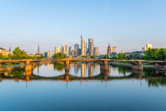 Frankfurt City Downtown, Ignatz Bubis Bridge and Main River at Sunrise. Wide Shot. Hesse, Germany