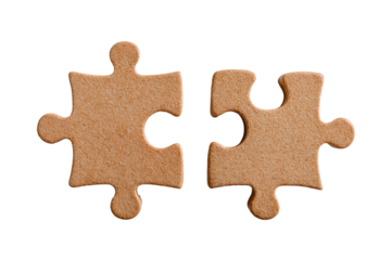 Two light beige puzzle pieces, slightly raised, separated but ready to connect, isolated on black
