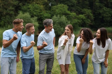 Team building. Group of happy people together outdoors