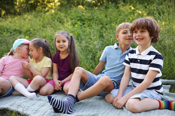 Fototapeta premium Children spending time in nature on summer day