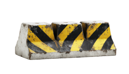A weathered concrete barrier,  triple-sectioned, with  yellow/black hazard stripes