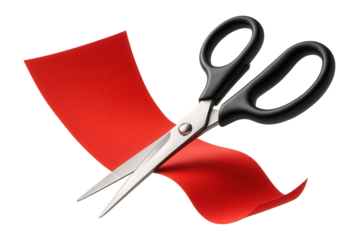 Pair of scissors cutting through a piece of red paper on transparent background.