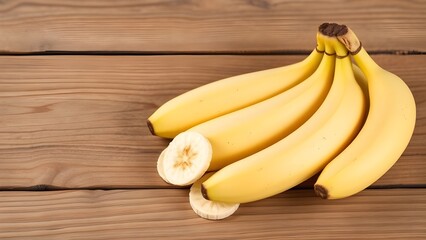bunch of bananas on a wooden background