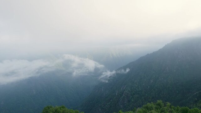 Drone shot of Chaukhamba Peak in Mansoona village near Gaundar in the Himalayan mountains, close to Madmaheshwar Temple and Ransi Village, Uttarakhand, India.