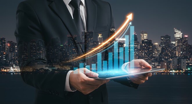 Businessman Holding Tablet with Growth Chart and Cityscape, Business and Financial Success Concept - Powered by Adobe