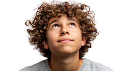 Boy's Dreamy Gaze: A young boy with curly hair gazes upward, lost in thought, his expression filled with curiosity, wonder, and a hint of hope.