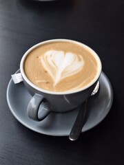 cup of cappuccino with a heart