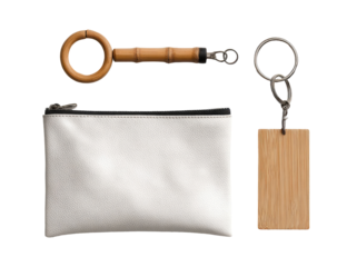 A minimalist set of accessories a key ring, a pouch, and a key tag, all in light beige and off-white