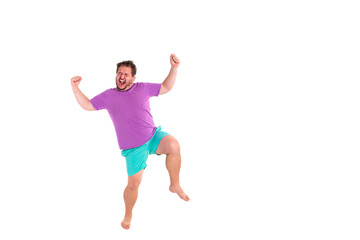 A funny fat man enjoys discounts in a store.