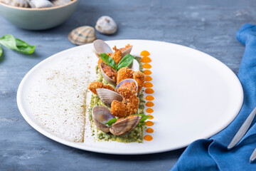 Fine Dining Seafood Plate with Clams and Avocado Puree
Fine Dining Seafood Plate with Clams and Avocado Puree