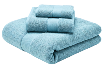Stack of soft folded blue terrycloth towels isolated on a transparent background