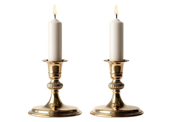 Two gold-toned candle holders with lit candles