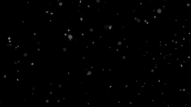 Floating dust particles on black background - perfect for cinematic overlays, visual effects, and dreamy motion graphics. Ideal for film, video edits, or animation.