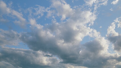 A Beautiful Cloudy Sky with a Blue and Serene Background, Creating a Calming Atmosphere