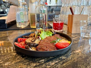 grilled beef steak with vegetables in a restaurant. High quality photo