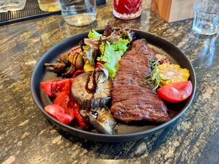 grilled beef steak with vegetables in a restaurant. High quality photo