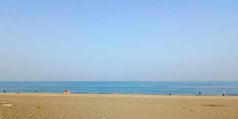 Serene beach on a clear day representing peace and relaxation