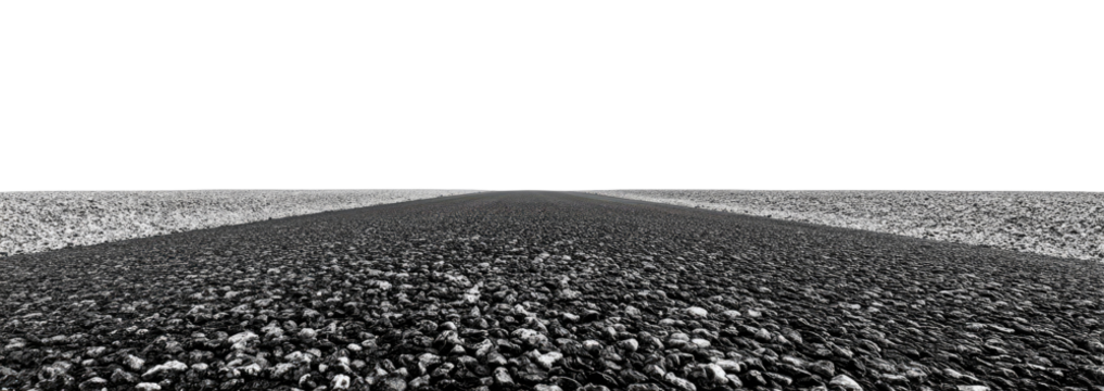Wide, empty, monochrome road stretches into the distance