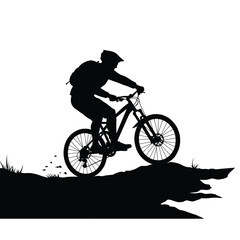 Obraz premium Silhouette of a Mountain Biker Riding Downhill cyclist