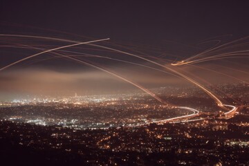 Night city panorama with blurred light trails