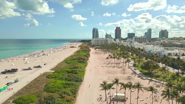 Summer in Miami from drone. Miami beach coastline. Panoramic view of Luxury condos in Miami Beach Florida. Aerial View of Surfside Miami Beach.