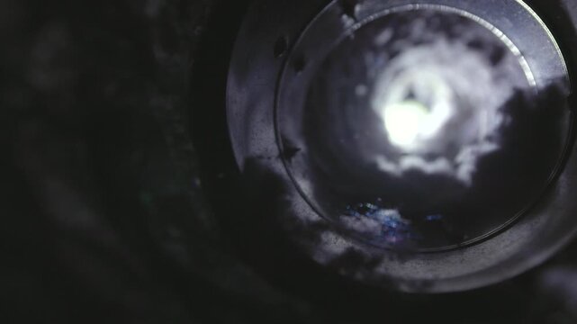 Close-up image of lint buildup inside a dryer vent, highlighting a common household fire hazard. The photo shows accumulated dust, fibers, and debris in the vent pipe, emphasizing the importance of re