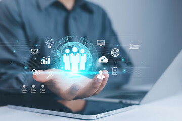 Businessman showing concept of human resources, employees, employment, management, training, HR, technology, business leadership concept, consulting, customer concept, digital service.	
